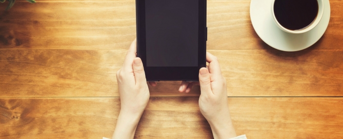 Person Reading an E-reader